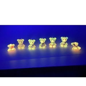 Handmade epoxy resin glow in the dark gummy bear charms!